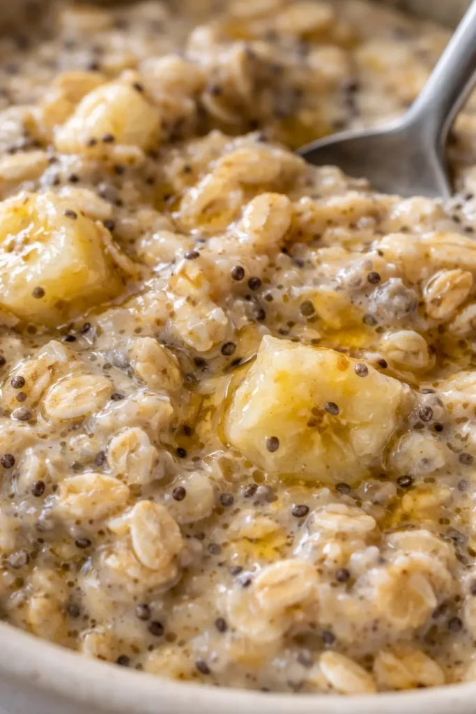 creamy overnight oats with banana and chia seeds close-up texture