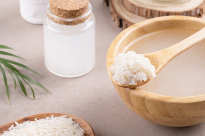rice soaking in water to prepare rice water for natural care use