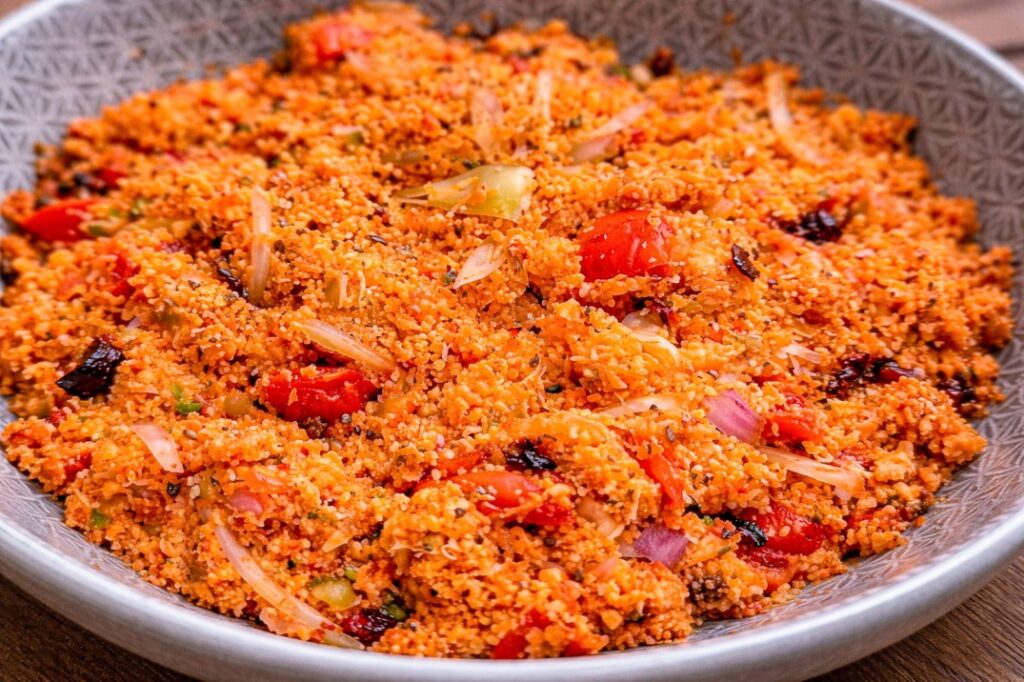 Close-up texture of Sri Lankan coconut sambol with chili, onion and tomato