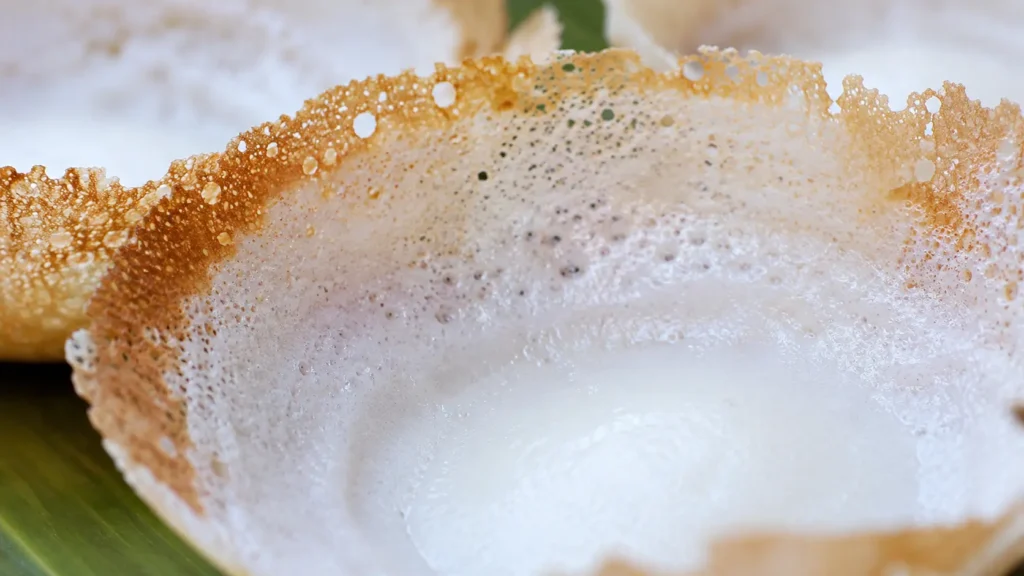 close-up texture of crispy Sri Lankan hopper with soft center