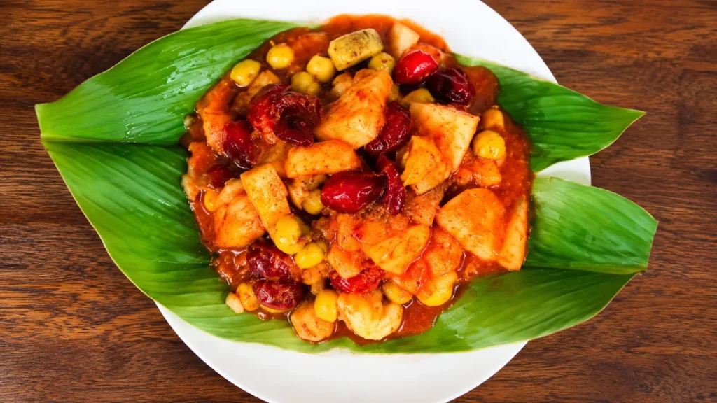 Sri Lankan mixed fruit achcharu served on banana leaves